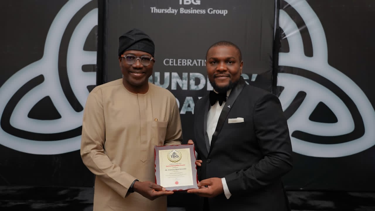 TBG presenting a Special Recognition Award to the Governor of Lagos State