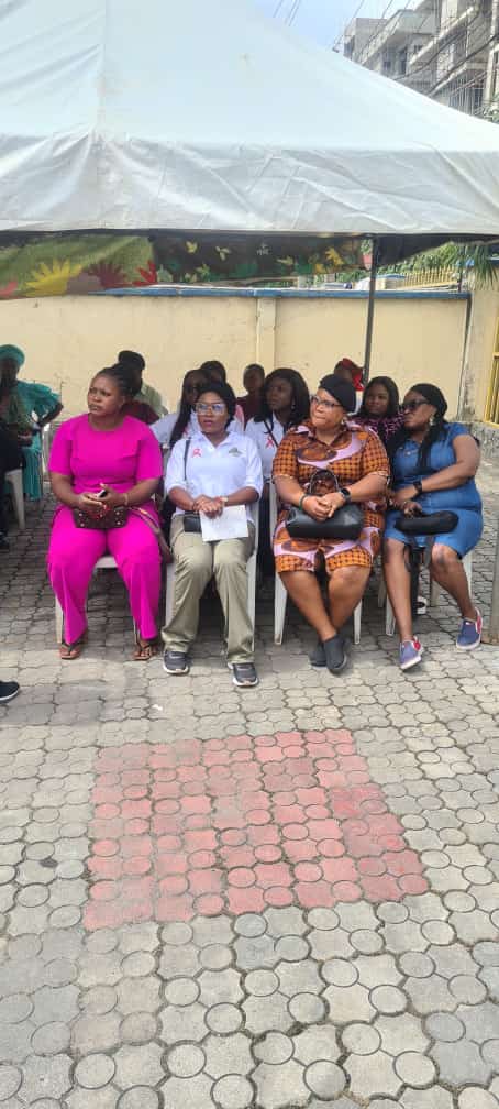 Women seated waiting for cervical cancer screening at a Kajola Foundation outreach